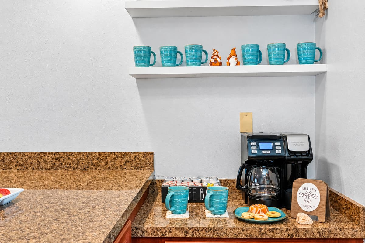 This charming coffee nook comes complete with mugs, and everything you need to start the day on a cozy note.