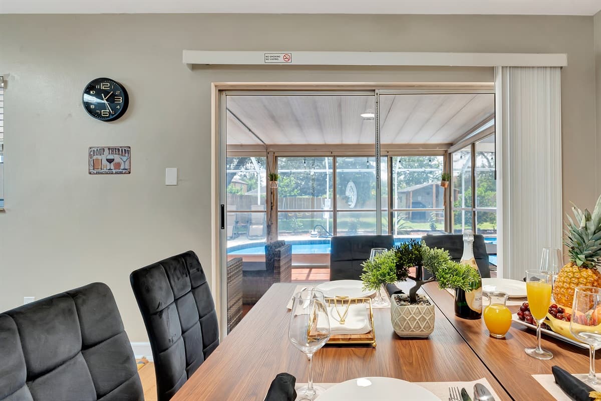 Imagine the possibilities as you dine in style, with the refreshing allure of the patio and pool just a slide away!