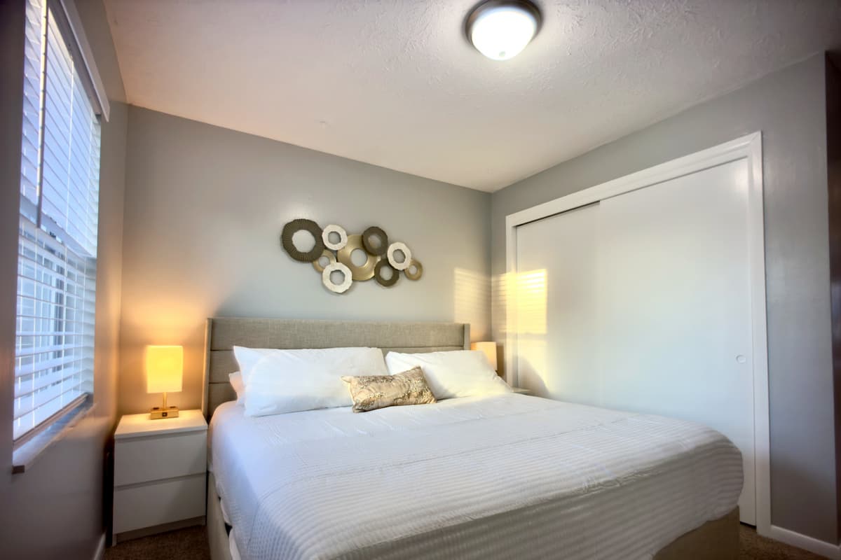 A warm and welcoming room with a queen-size bed, perfect for unwinding after a long day.