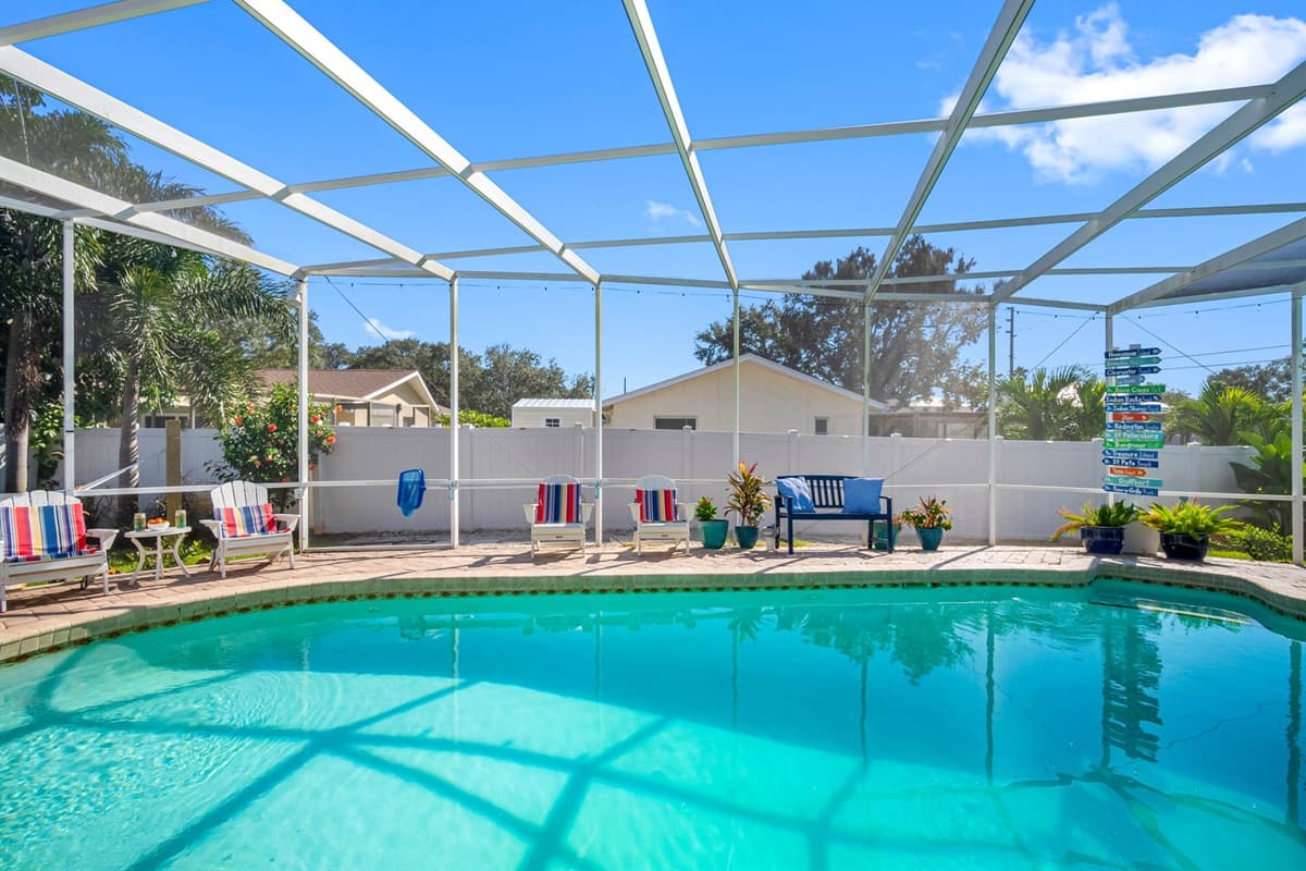 Unwind on cushioned patio furniture, enjoy drinks by the pool, or simply listen to the quiet rustle of palm trees — every corner of this space invites relaxation.
