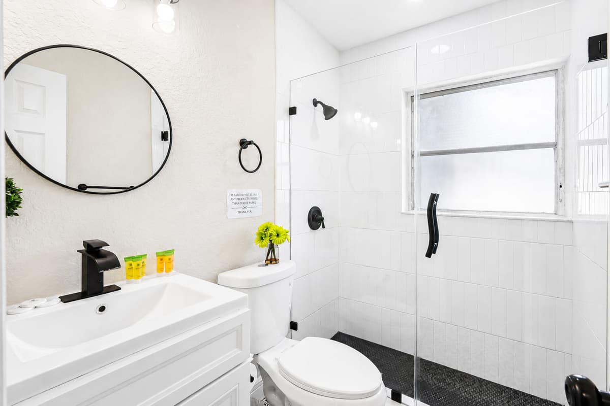Generous vanity space and well-lit mirrors make it easy to get ready in the morning, while under-sink storage or open shelving helps keep your toiletries neatly organized throughout your stay.