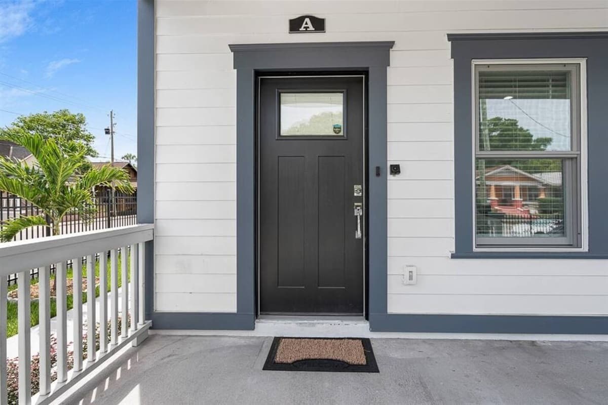 The stunning door leading to the beautiful inside of this lovely property! Bring family and friends on this staycation! Send us a message and book now!