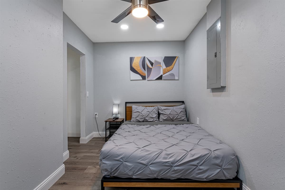 Beautiful bedroom with a queen-sized bed, drawers for storage and smart TV. Sleep comfortably after a long day of travel from your home to your home away from home. Like what you see? Send us a message