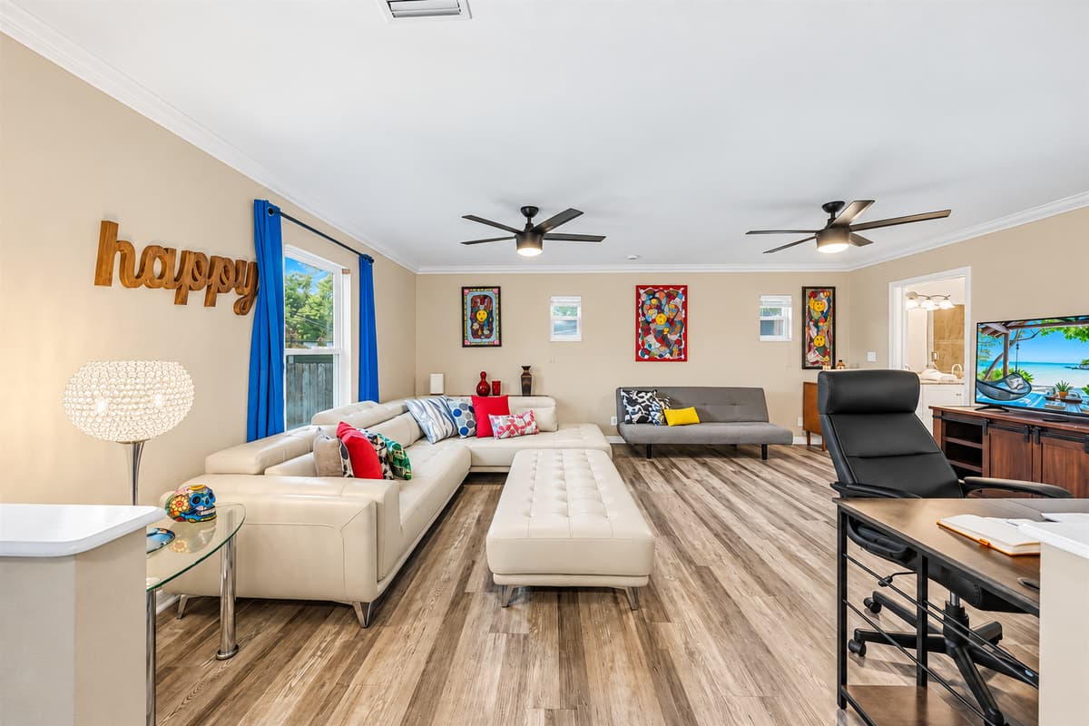 Wide-angle view of the main living area showcasing generous seating, open design, and welcoming atmosphere.