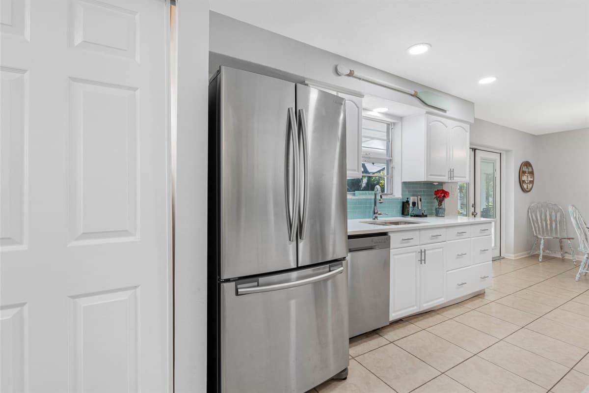 Stocked with essential appliances including a refrigerator, oven, stove, microwave, coffee maker, and more.