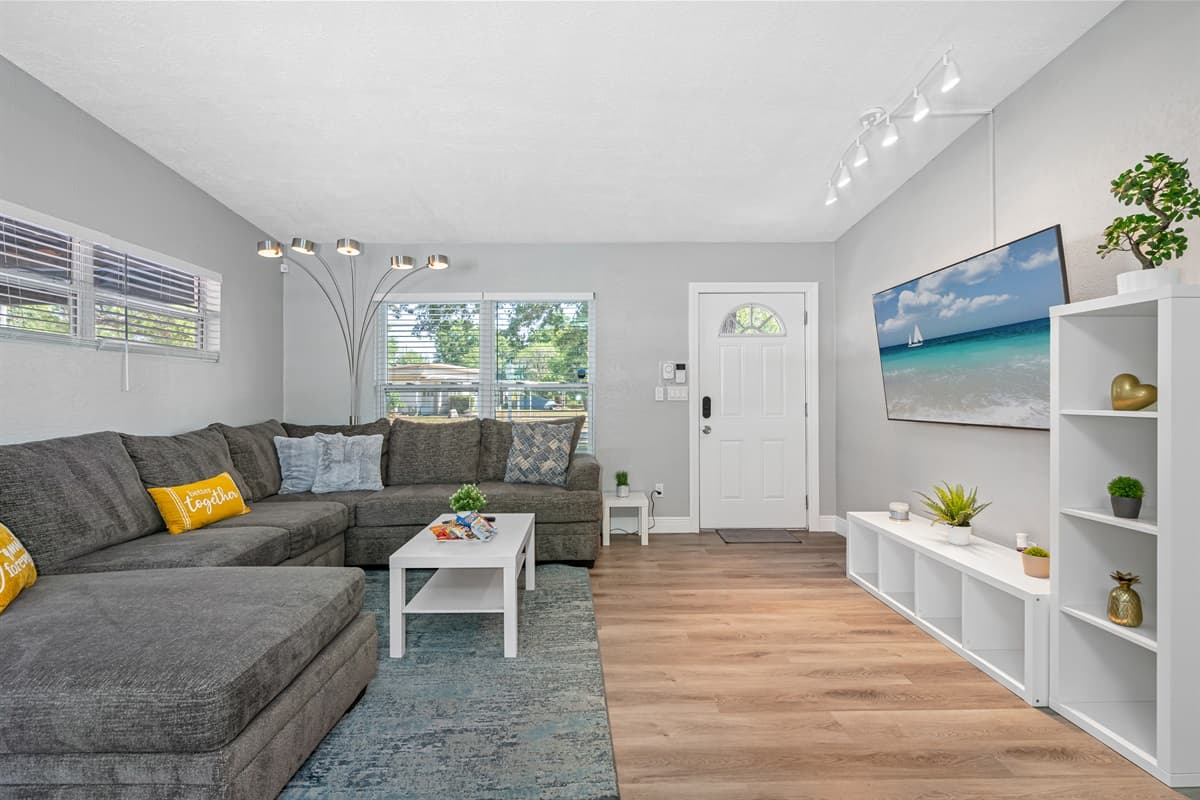 . The wooden floor adds warmth and character to the room, giving it a classic and timeless look.