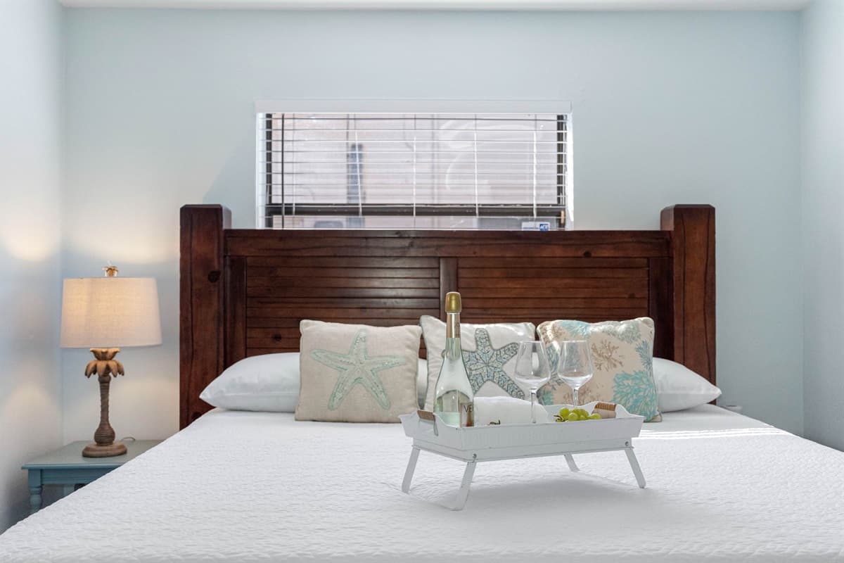 Thoughtfully furnished, the room includes nightstands with soft lighting, a dresser for ample storage, and a spacious closet to accommodate your belongings.