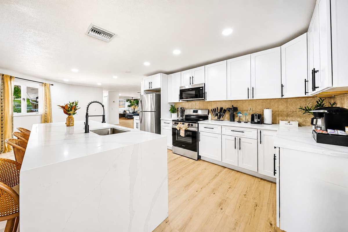 Counter space you actually get to use. Room to prep on one side, unpack groceries on the other, and still set down the coffee.