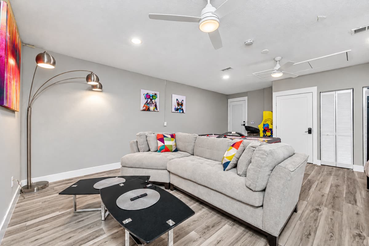 This amazing bedroom has its own chill area where kids or kids at heart can enjoy watching movies or series they like. More reasons to book this stunning property! Inquire now!