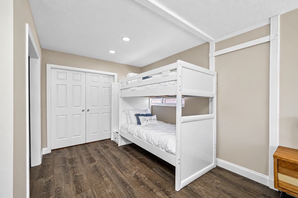 Bunkbed and a queen size bed for a small family or a group of friends who wants to hang out and sleep in one room. It is very spacious and has a very nice view. If you are interested to book this house, Send us a message now!