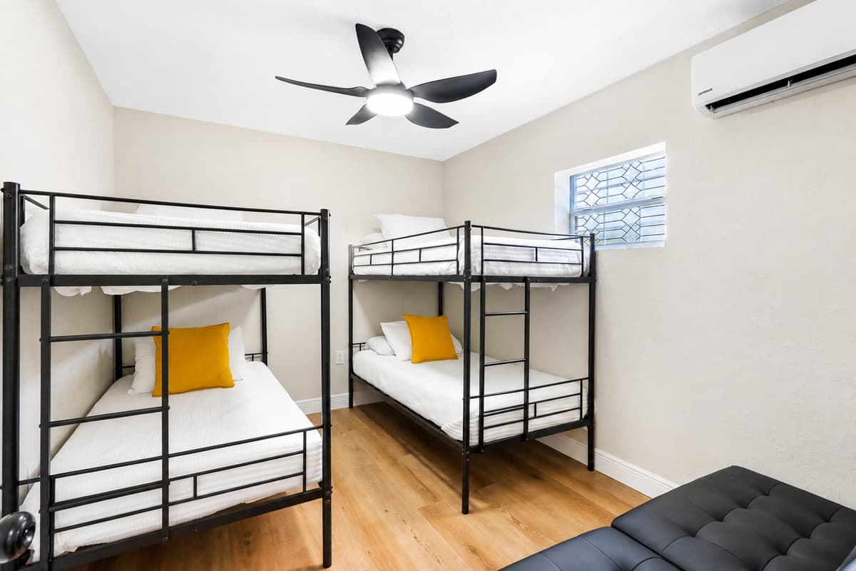 This bedroom is the ultimate fun and functional space—perfectly tailored for kids, teens, or groups traveling together.
