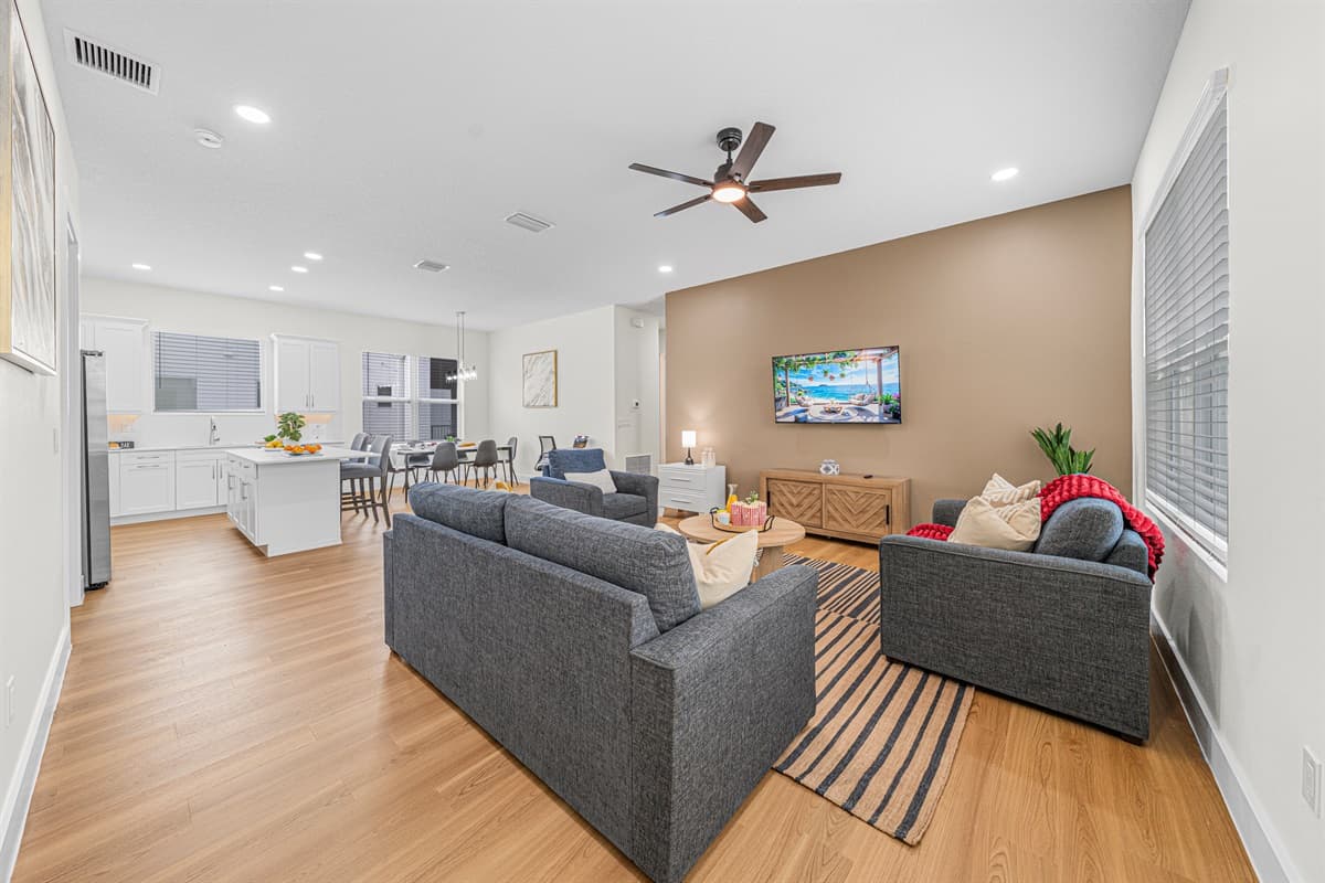Expansive open-concept layout combining living room and kitchen—perfect for entertaining.