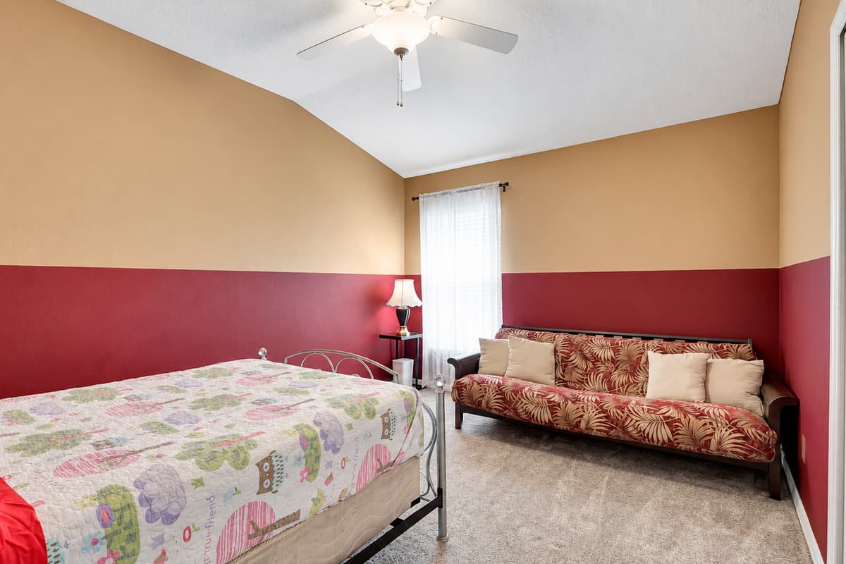 The bedroom itself is a symphony of style and functionality.