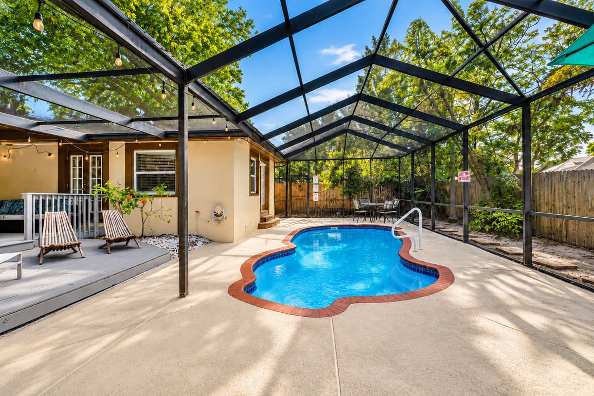 Spacious screened pool area perfect for relaxing, swimming, and enjoying the Florida sunshine.
