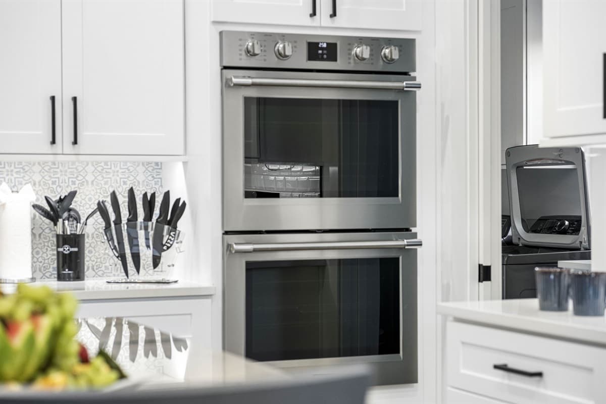 Fully equipped with modern, high-performance appliances and thoughtful layout, this kitchen seamlessly combines luxury with practicality to elevate every culinary experience.