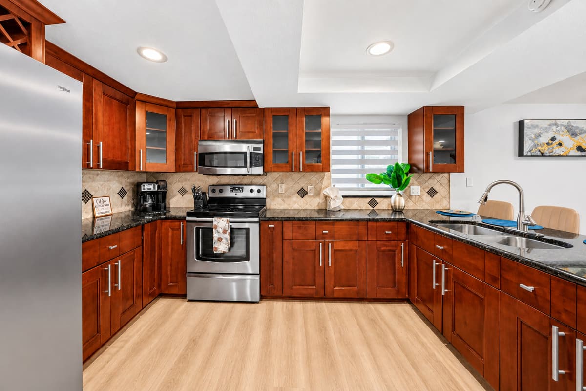 Fully equipped chef-friendly kitchen with abundant cabinetry, modern appliances, and everything needed for home-cooked meals.