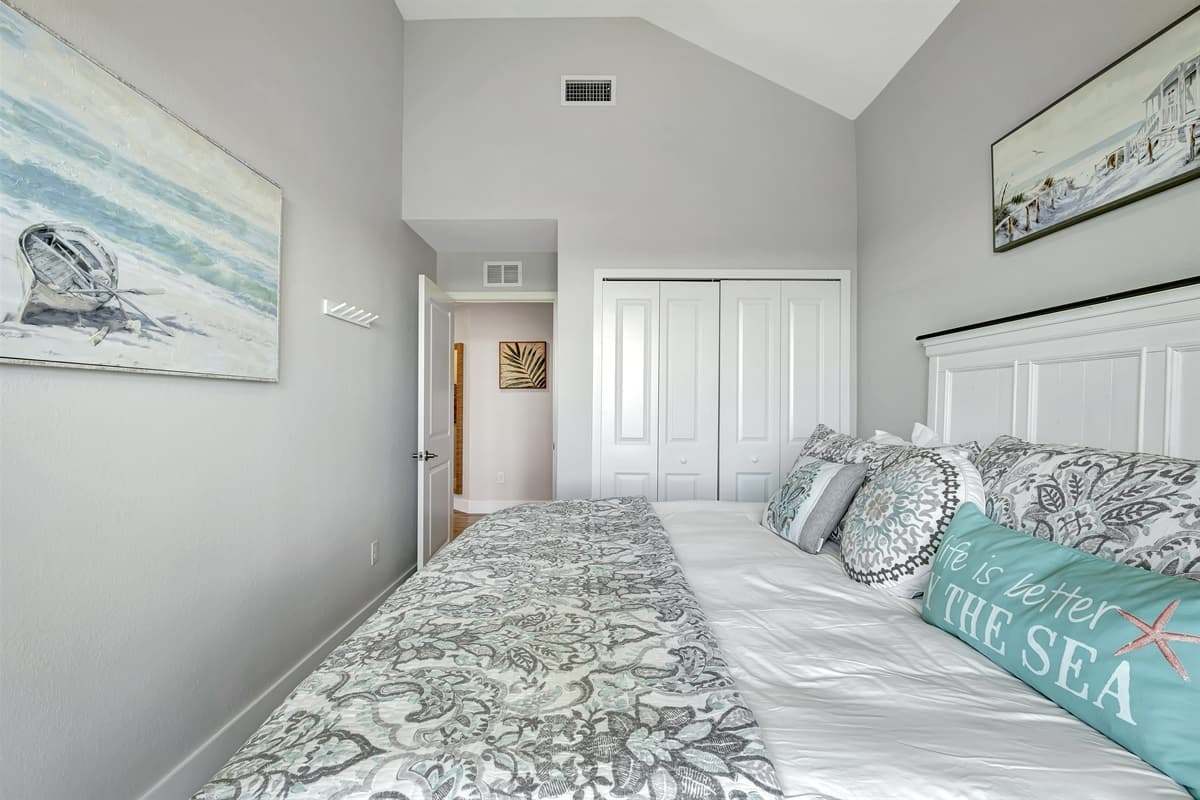 This bedroom isn't just a place to rest your head; it's an experience of comfort, a sanctuary of space and light, a symphony of serenity.