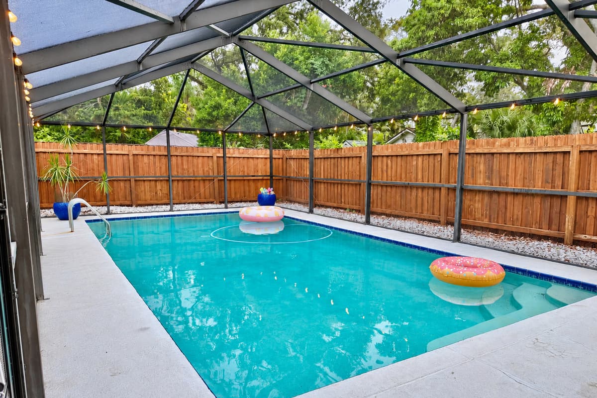 Dive into your own tropical escape—this screened pool offers total privacy and crystal-clear waters all to yourself.