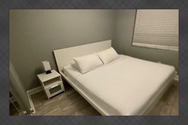 Features a spacious king-size bed and a clean, modern design. Soft lighting, neutral tones, and simple décor create a cozy and relaxing atmosphere. *Updated photos will be uploaded soon!