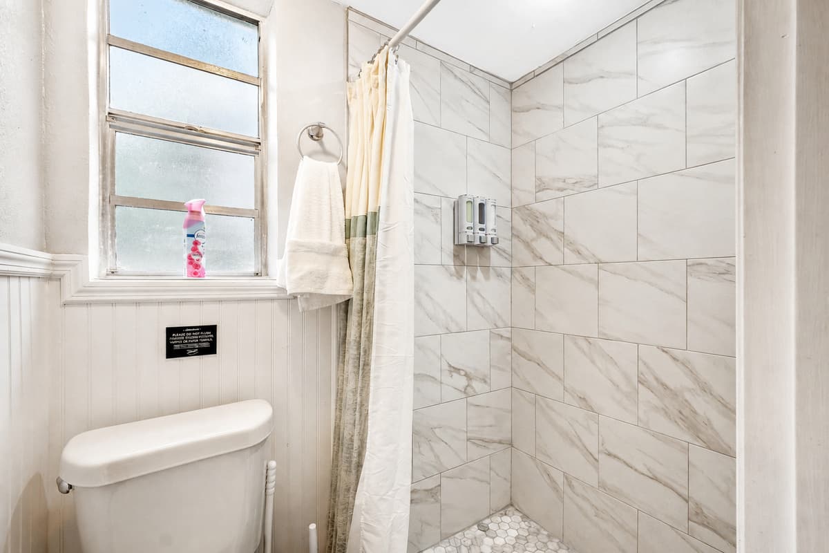 This isn't just a utilitarian space; it's a sanctuary where each element has been curated to elevate your personal oasis to new heights.