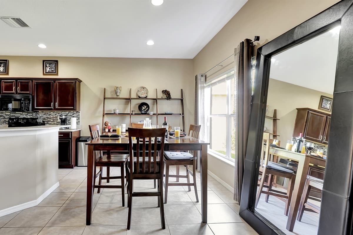 Whether it's a cozy dinner for two or a lively gathering of friends and family, our dining room sets the stage for unforgettable moments.