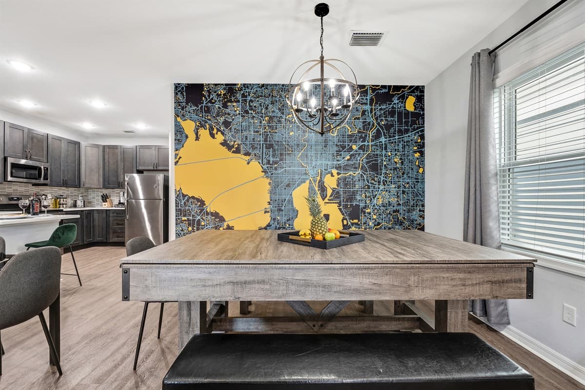 The convertible pool table, with its rich wooden finish and precision craftsmanship, beckons enthusiasts to indulge in a game of billiards.