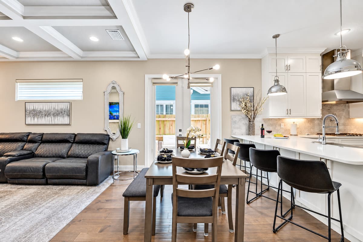 In front of the dining area, the breakfast table offers a more casual dining option.
