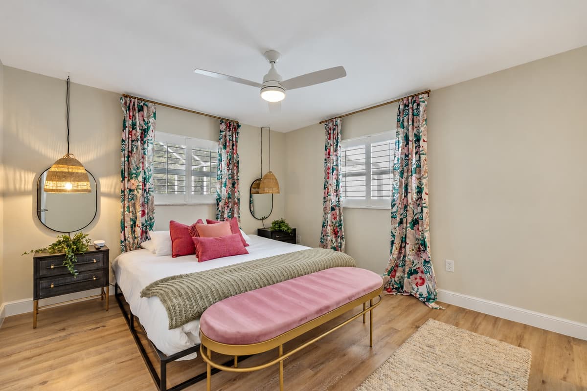 Dressed in luxurious linens and adorned with an array of plush pillows, the bed beckons you to sink into its comfort and unwind after a long day.