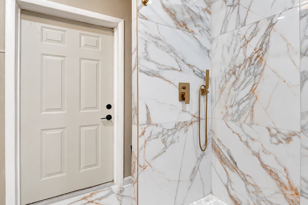 Indulge in opulence in our bathroom retreat, where timeless elegance meets modern comfort.
