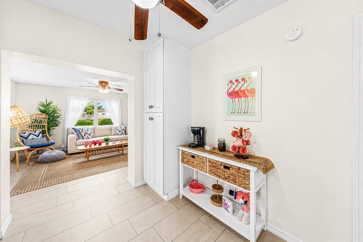 Entry view near the kitchen with additional storage and easy flow into living spaces.