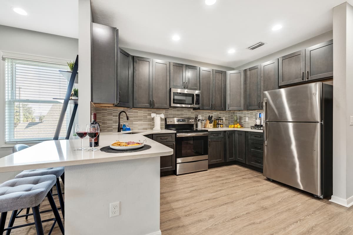 Ample cabinet space and cleverly designed storage areas provide not only functionality but also an opportunity for organization.