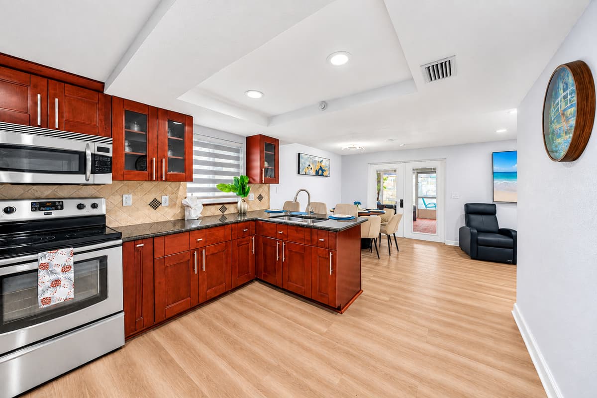 Spacious chef-friendly kitchen featuring modern appliances, abundant counter space, and everything needed to prepare home-cooked meals.