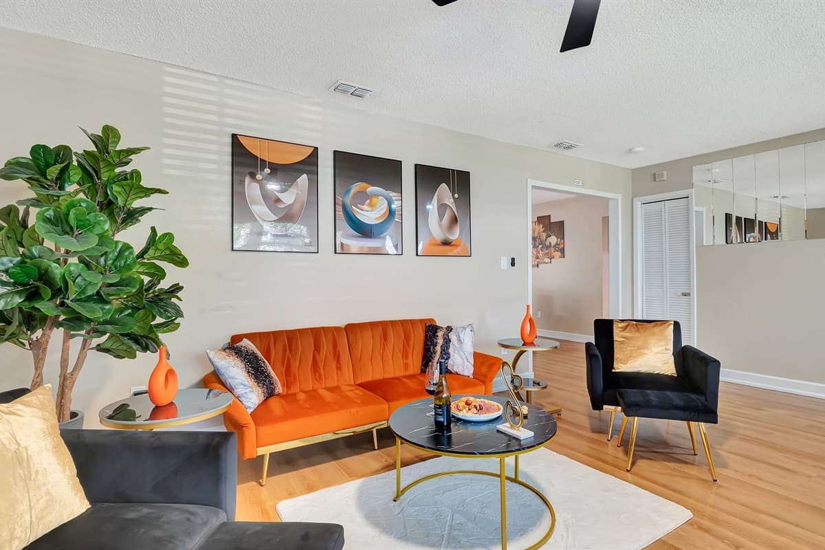 This room boasts an expansive seating arrangement meticulously crafted for both relaxation and socializing.