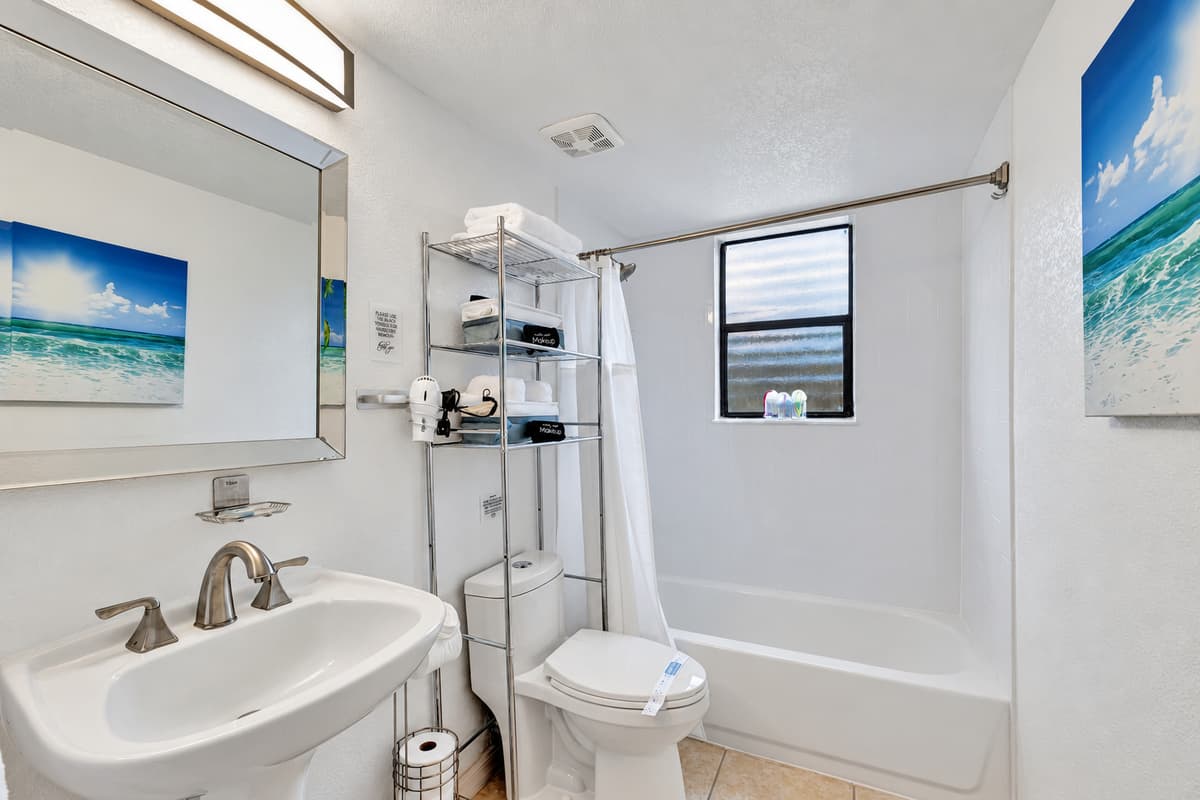 This bathroom is a perfect blend of functionality and style, ensuring that all your needs are met in a serene and inviting environment.