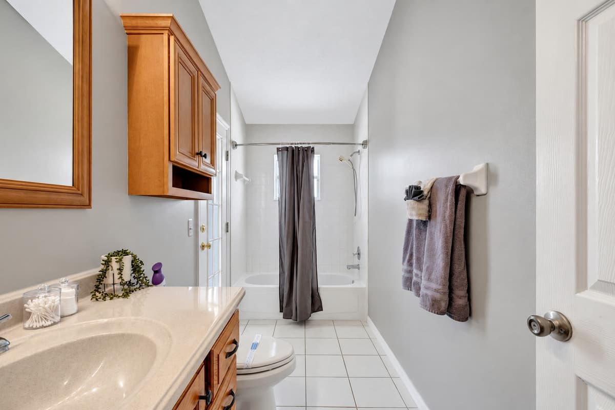 Indulge in the epitome of luxury as you step into our exquisite bathroom, where a magnificent bathtub takes center stage, inviting you to surrender to its soothing embrace.