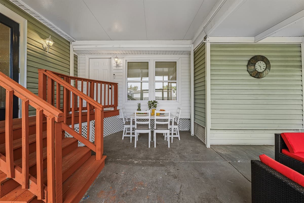 Outdoor dining and lounge area with direct access to the home—ideal for gatherings.