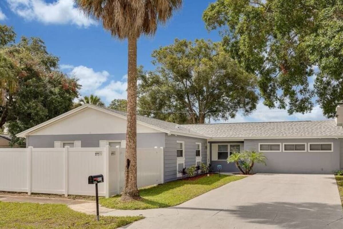The gorgeous front view of the house showcases our beautiful front yard and driveway. If you are interested in this property, send us a message! Book now!
