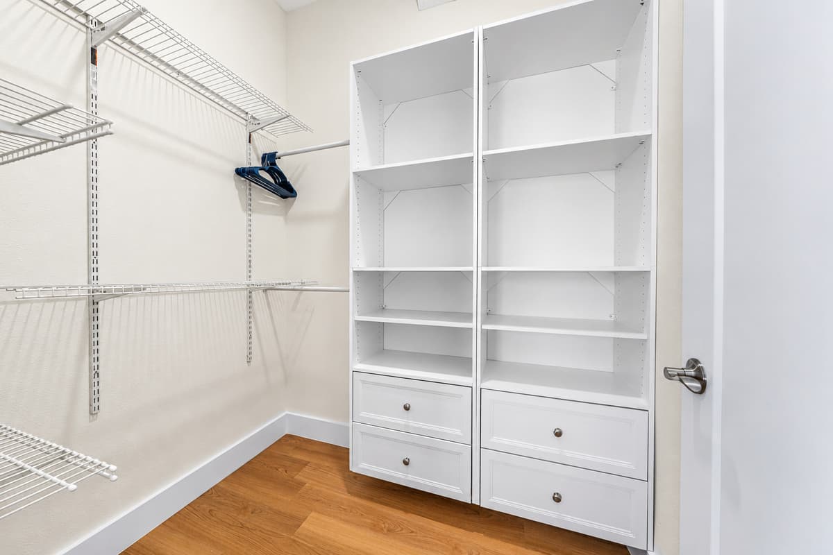 Generous closet space with built-in shelving and hangers — unpack and settle in like it's your own home.