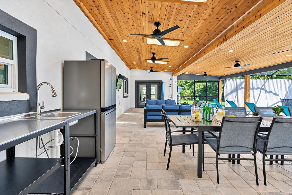 Prep counter, sink and a shaded table — the kitchen you'll actually use this week.