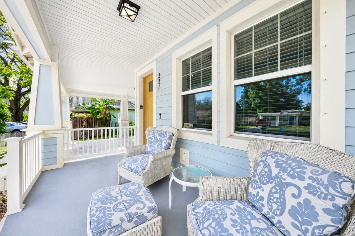 Enjoy the peaceful neighborhood from the spacious covered front porch, perfect for relaxing any time of day.