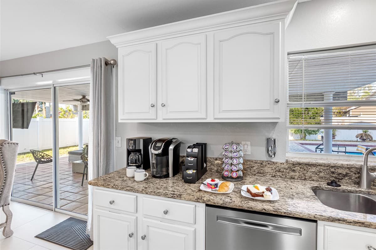 Experience our stunning, contemporary kitchen, complete with all the essentials to unleash your inner chef. There's no substitute for the joy of preparing and sharing home-cooked meals with your loved ones.