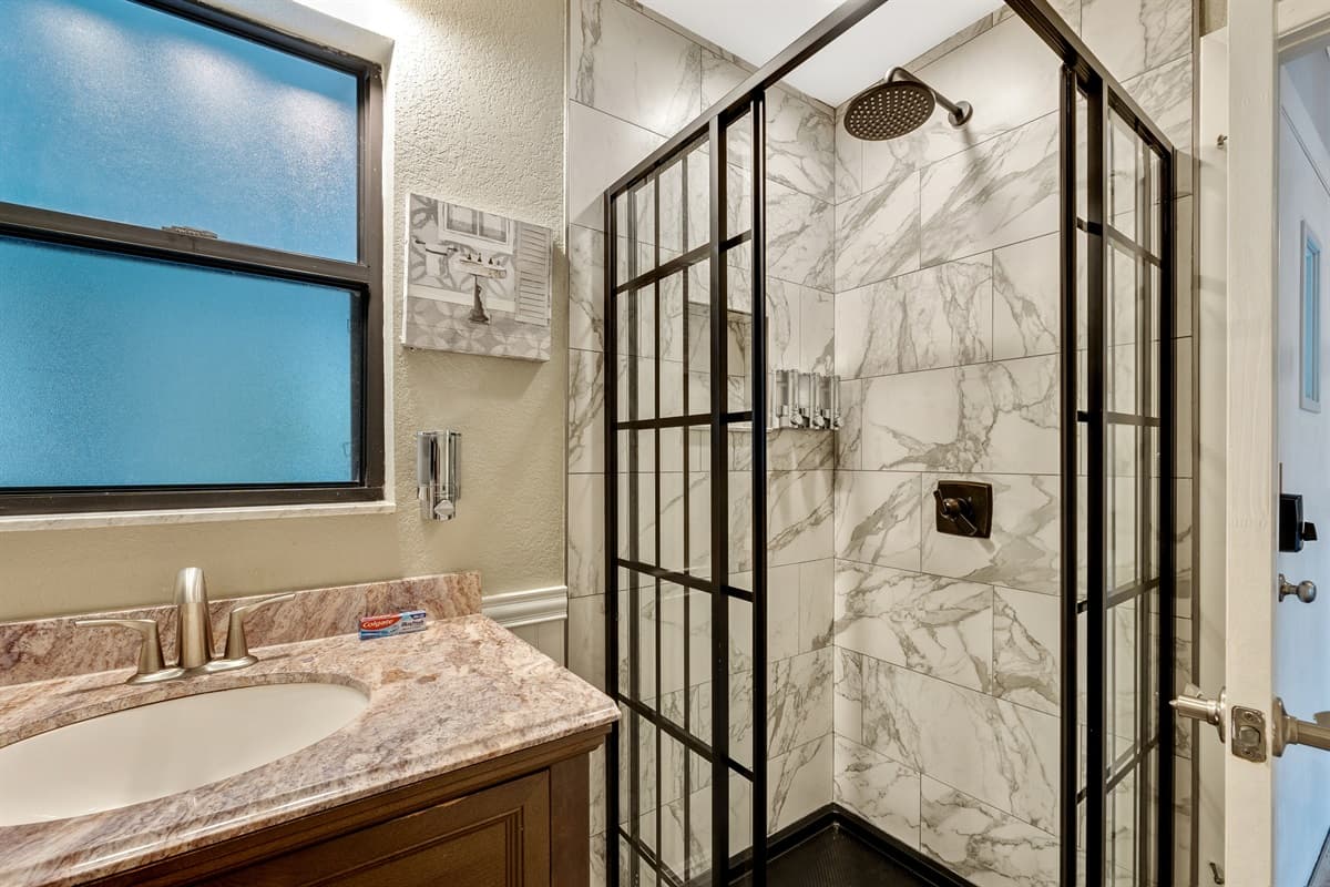 Our full bathroom offers a harmonious blend of style and functionality.