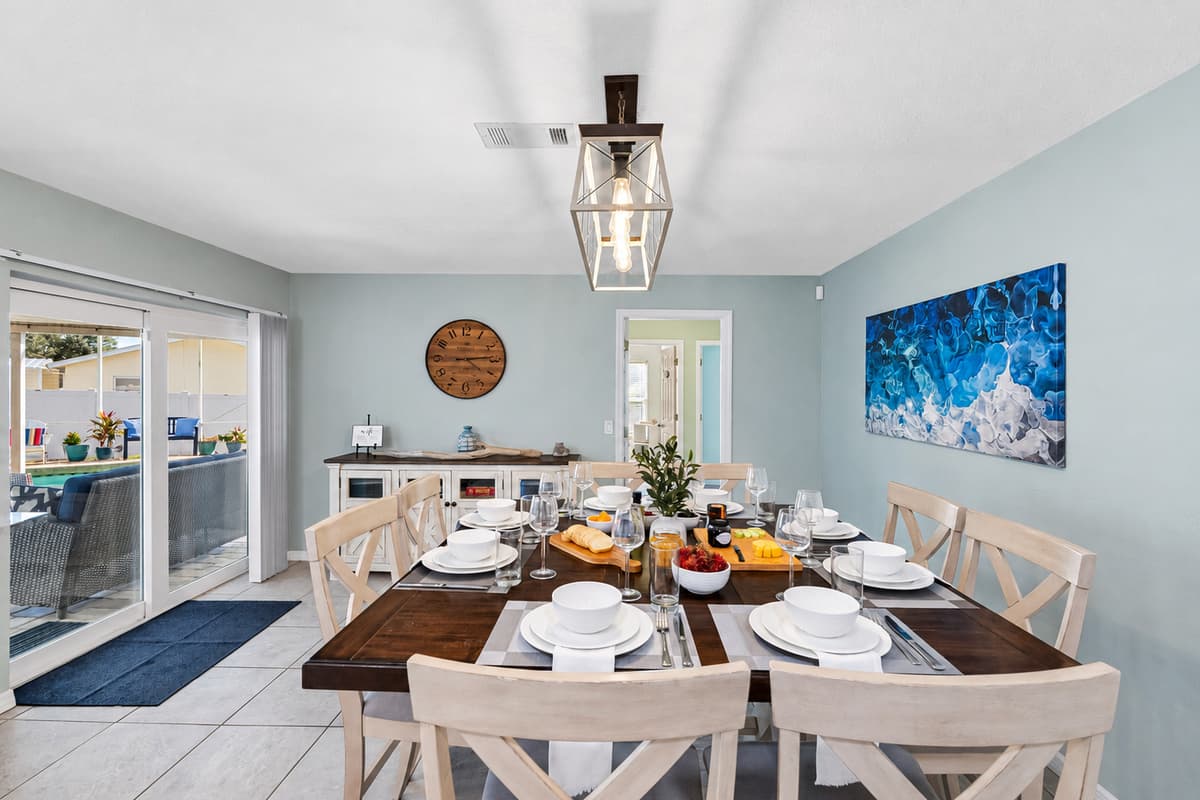 This elegant dining space comfortably seats up to eight guests, perfect for shared meals and memorable moments.