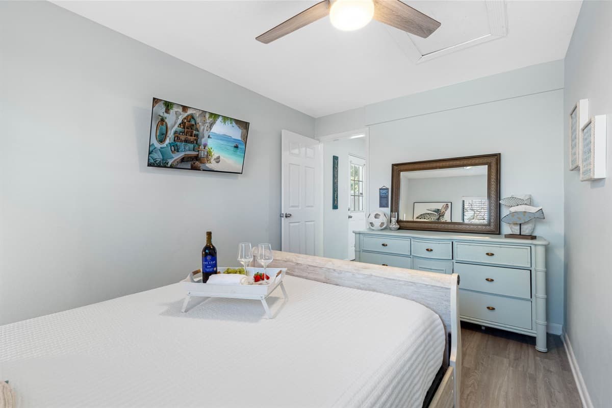 The suite also includes ample storage, with closets and drawers to keep your belongings organized and accessible.