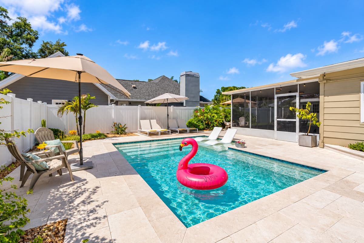 Soak in the sun poolside or float away on a flamingo in this serene, resort-style retreat.
