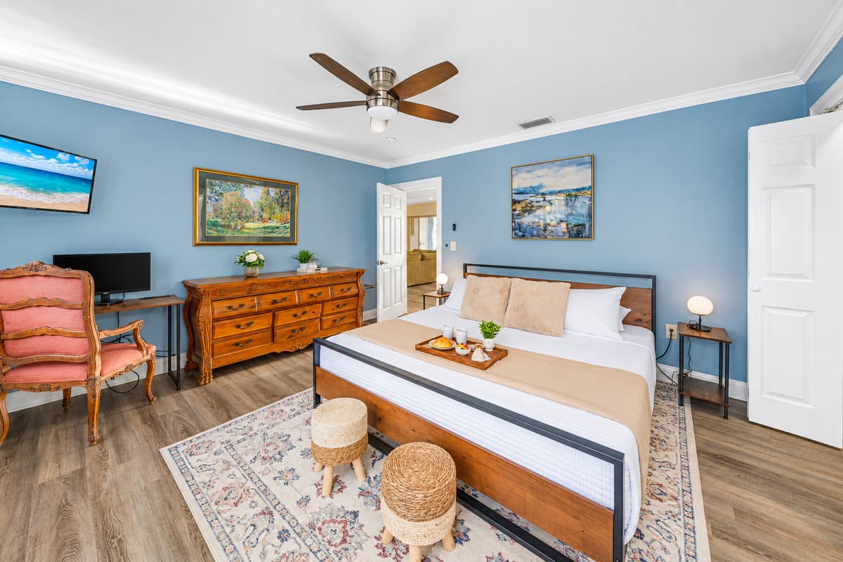 Designed with relaxation in mind, this king bedroom features calming décor and a cozy atmosphere.