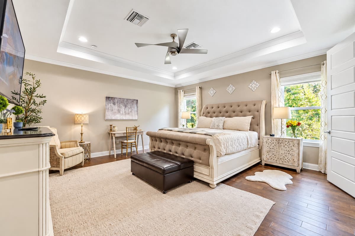 Nestled in this inviting space is a comfortable queen-size bed, adorned with soft linens and plush pillows that promise a restful night's sleep.