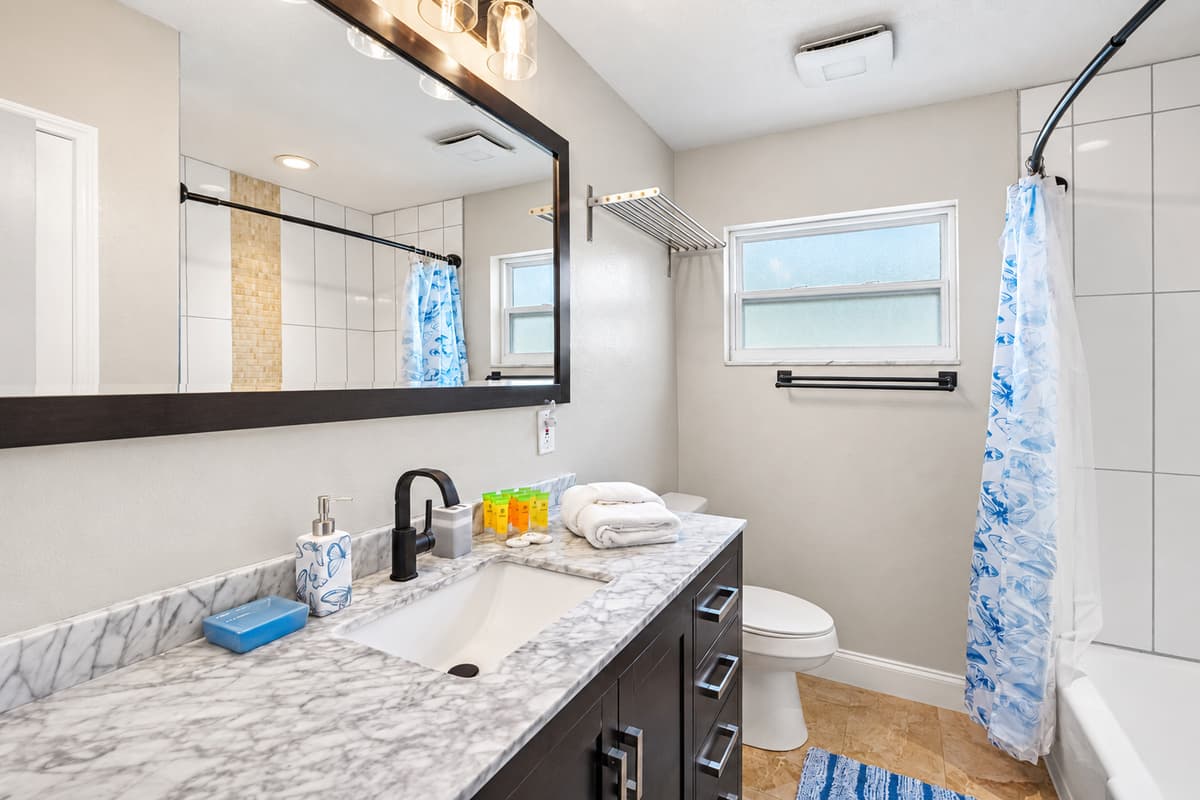 Clean, bright, and comfortable—this full bath offers plenty of counter space, and a peaceful atmosphere.