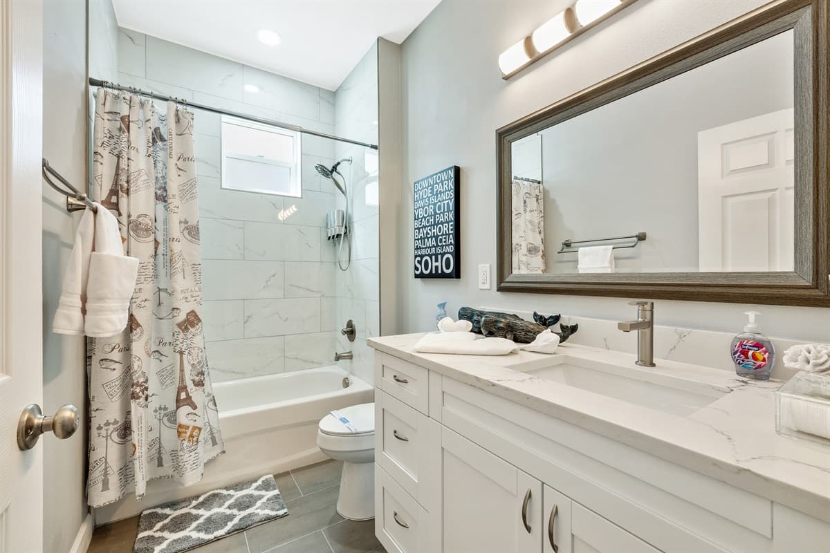 Thoughtfully designed to maximize space, this room features modern fixtures, smart storage solutions, and a minimalist aesthetic.
