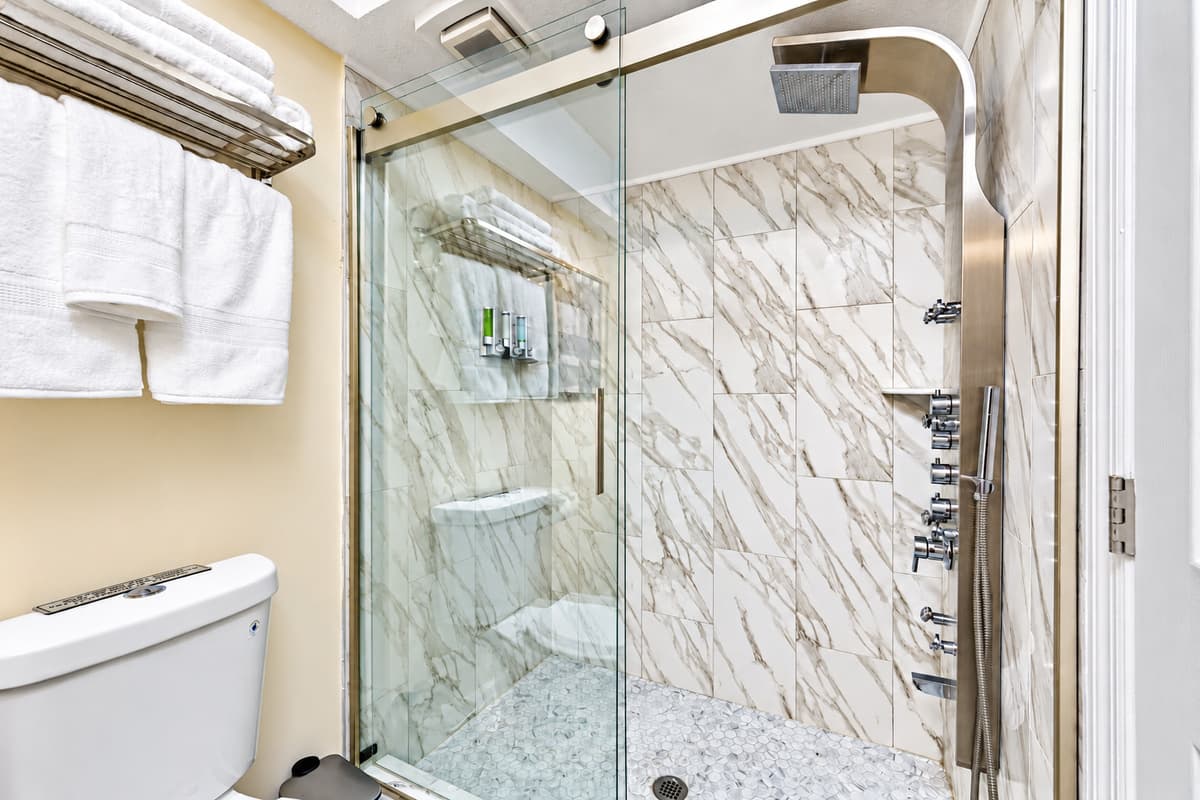 Great bathroom with toilet, sink, and walk-in shower. Feel fresh and clean after a long day of travel from your home to your home away from home. If you are interested in this property, send us an inquiry now!
